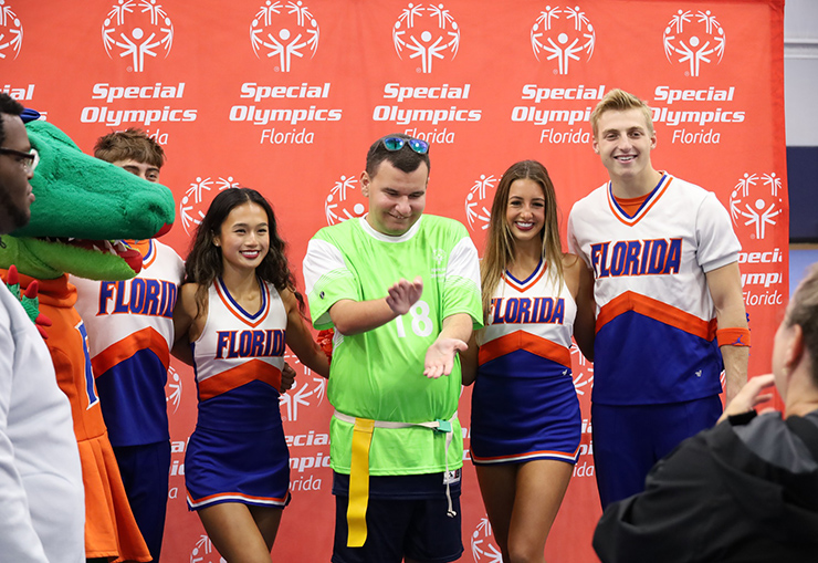 Athletes and volunteers celebrate at Legacy Park in Alachua during the Northeast Regional Special Olympics, where teams from across the region competed in softball, flag football, deadlifting, and pickleball. /   Photo special to Alachua County Today